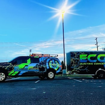a colorful truck is parked in a parking lot